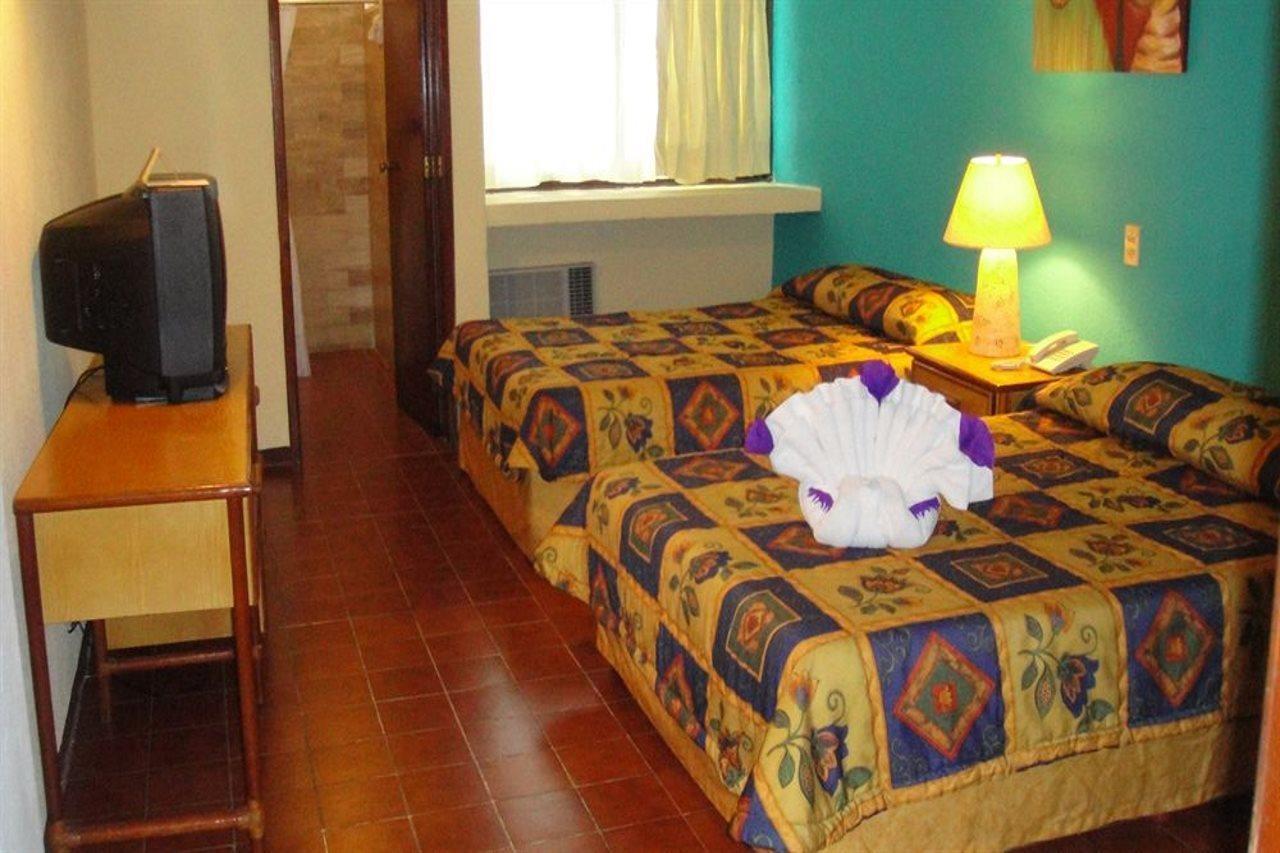 Hotel Plaza Cozumel Quarto foto